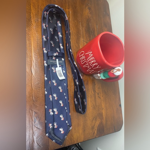 Pronto Uomo Men’s Christmas Navy Tie
Dog in Santa Hat - Picture 5 of 6